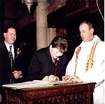 Sandra signing the register